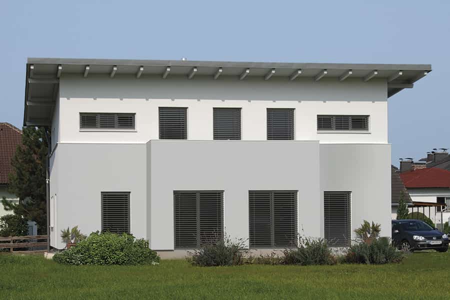 Modernes Einfamilienhaus grau weiss Pultdach zweigeschossig Priewasser Baugesellschaft PRI21